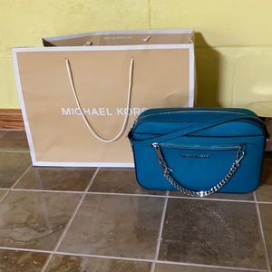 Authentic Micheal Kors teal bag and Jet set travel
